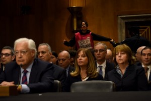 A demonstrator interrupts David Friedman, the nominee to be U.S. ambassador to Israel, as he spoke before the Senate last month. (Michael Robinson Chavez/The Washington Post)